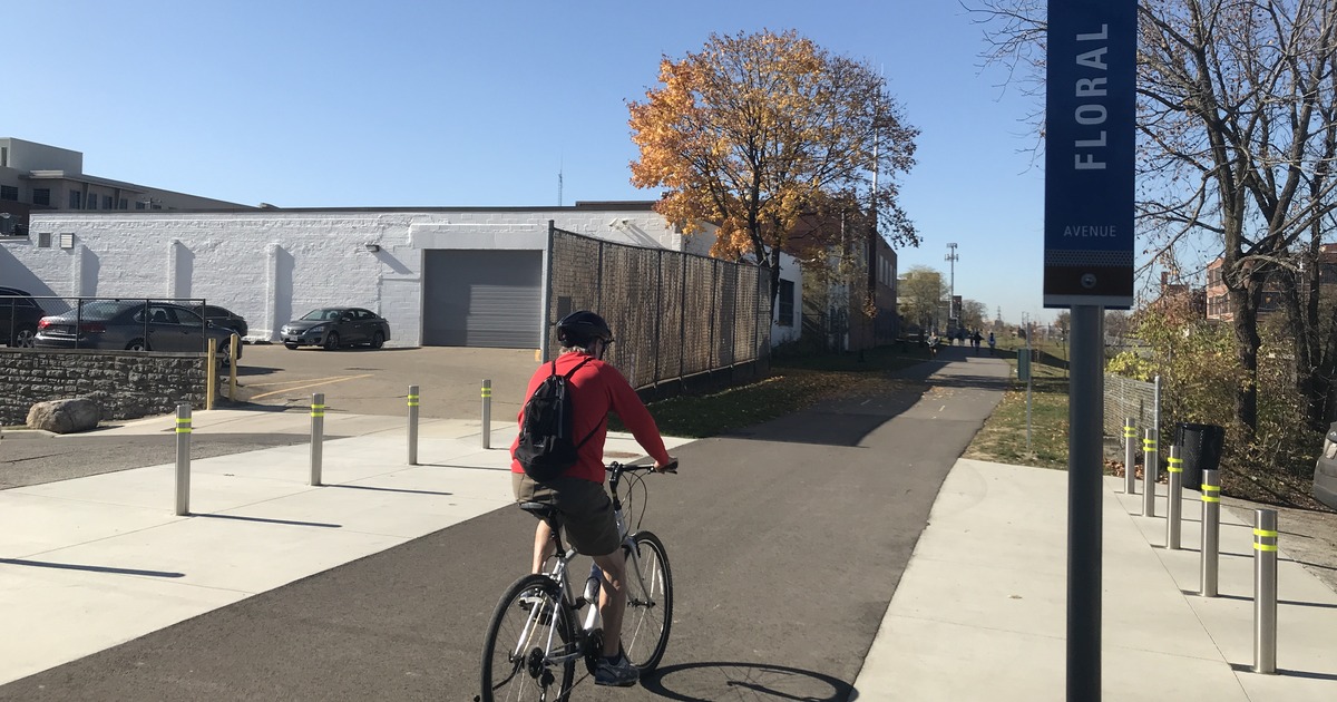 Photo of a bicycle rider on the Wasson Way trail in Ward 2